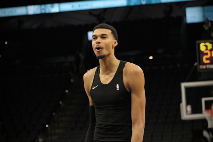 Jan 4, 2024; San Antonio, Texas, USA; San Antonio Spurs forward Victor Wembanyama (1) reacts during warmups prior to facing Giannis Antetokounmpo and the Milwaukee Bucks.